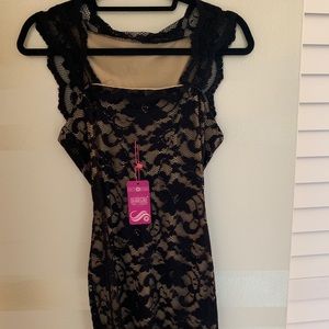 Black bodycon dress.